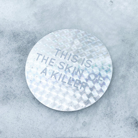 “This is the Skin of a Killer” holographic vinyl sticker